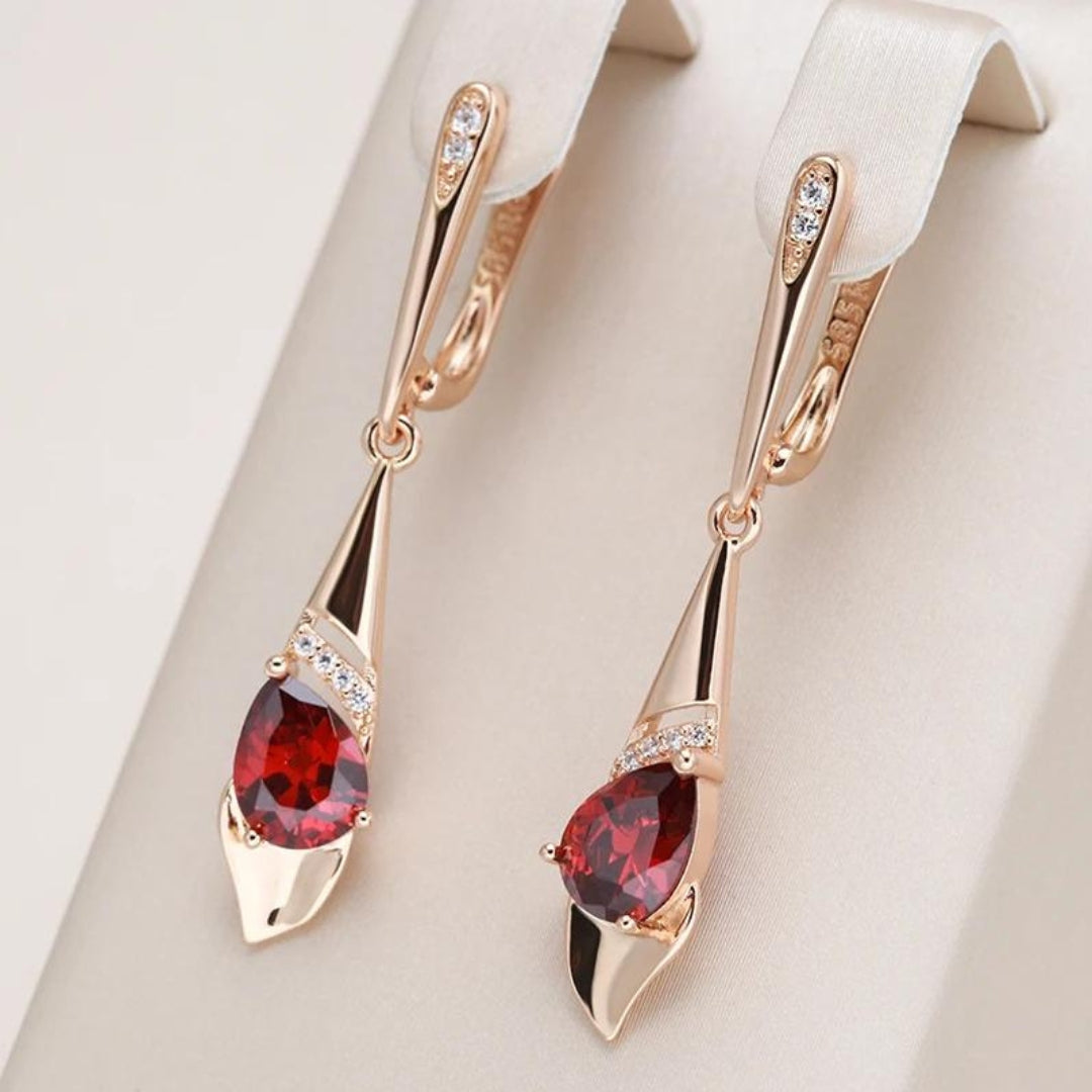 Elegantes Caravanas con Cristal Rojo en Oro