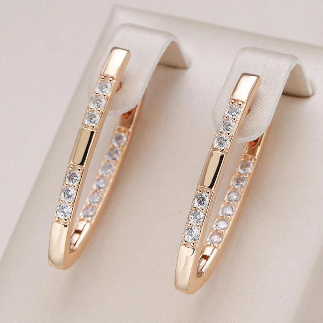 Elegantes Caravanas de Oro con Circonitas