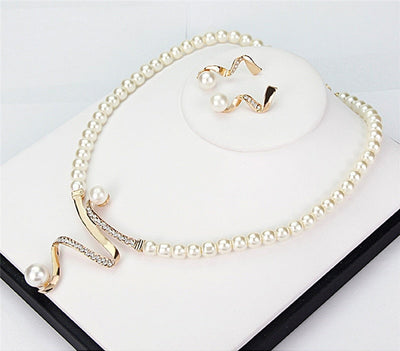Conjunto Collar + Caravanas de Perlas Naturales