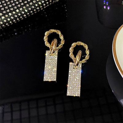 Caravanas Circonitas Lujosas en Plata y Baños con Brillantitos Incrustados