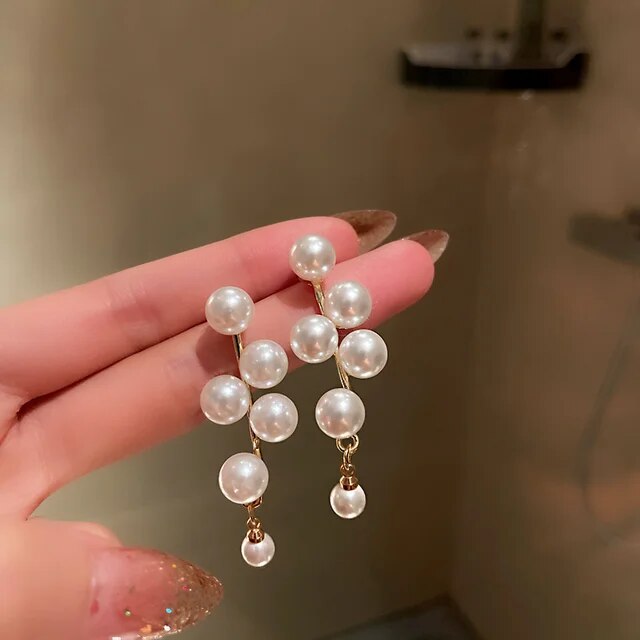 Caravanas Perlas y Oro Elegantes