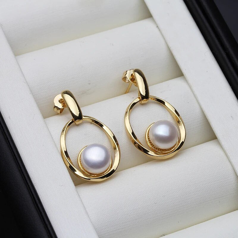 Caravanas Oro y Perla Elegantes