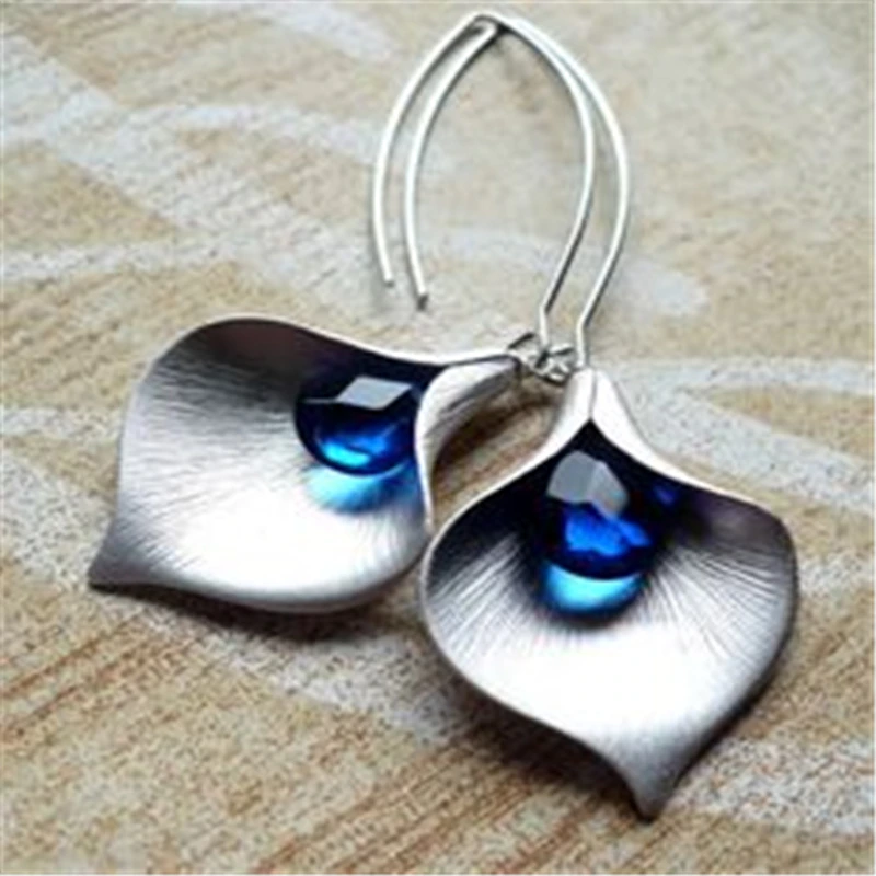 Caravanas Vintage de Lotus con Cristal Azul