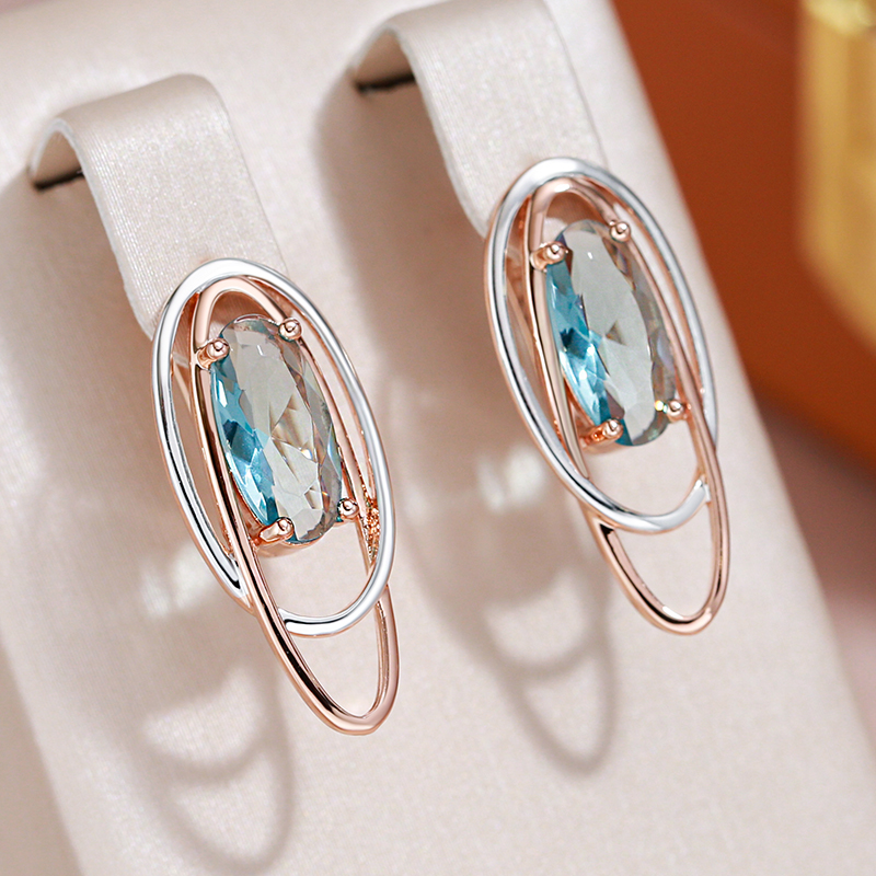 Caravanas Elegantes con Cristal Turquesa en Oro y Plata