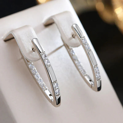 Elegantes Caravanas de Oro con Circonitas