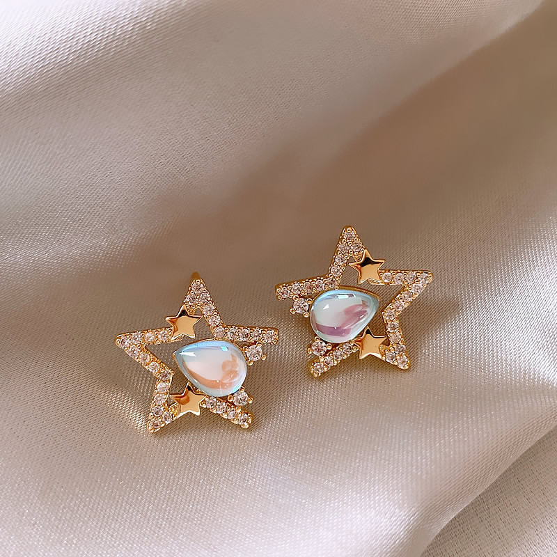 Elegantes Caravanas Estrella en Diamantes