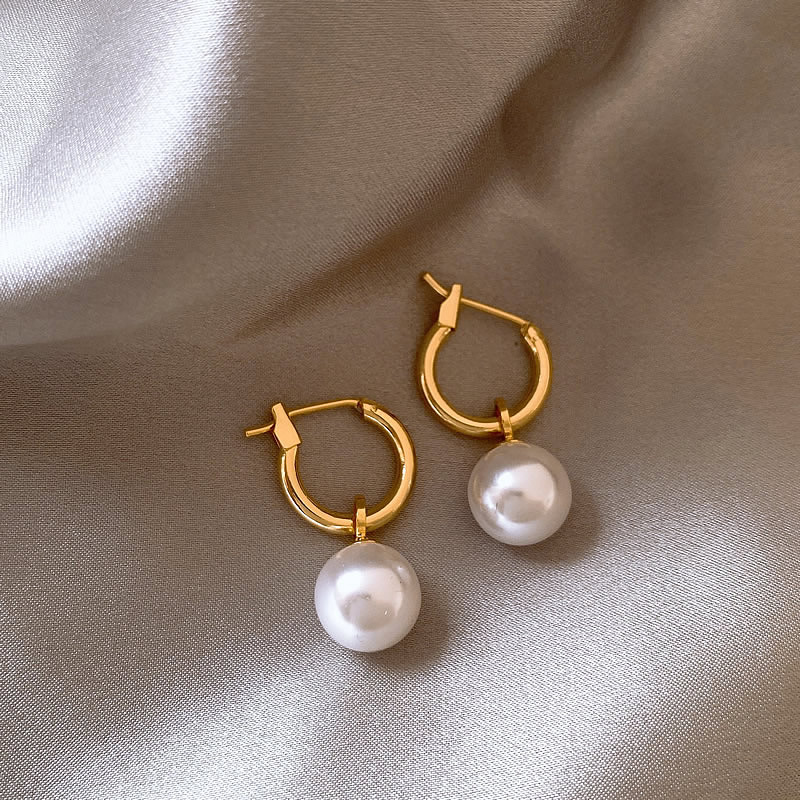 Elegantes Caravanas con Cuentas de Oro