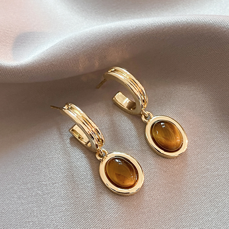 Elegantes Caravanas de Cristal Naranja y Oro