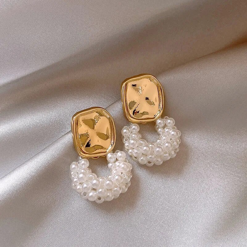 Caravanas con Perlas en Oro