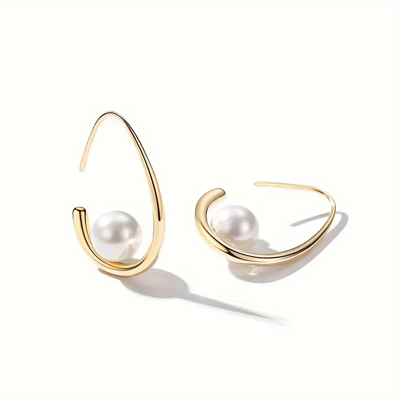 Caravanas con Perla y Oro Elegante